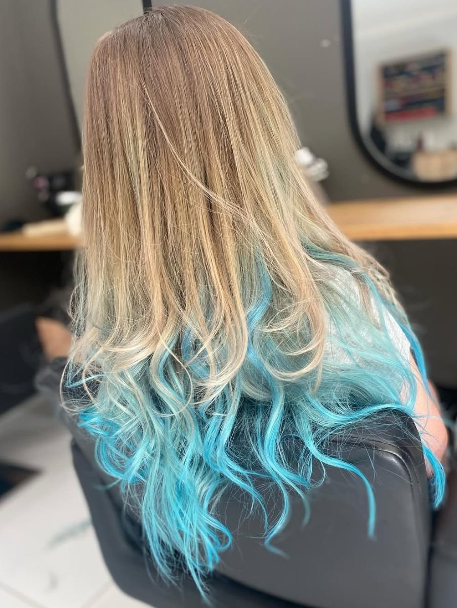 Blonde to turquoise ombre on long hair